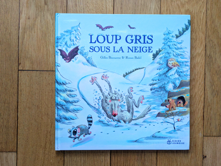 Loup gris sous la neige de Gilles Bizouerne et Ronan Badel.
